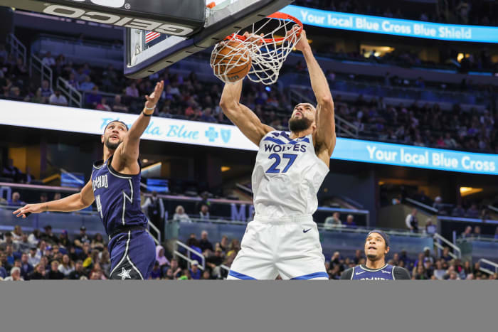 Rudy Gobert (27) dunks the ball against the Orlando Magic.
